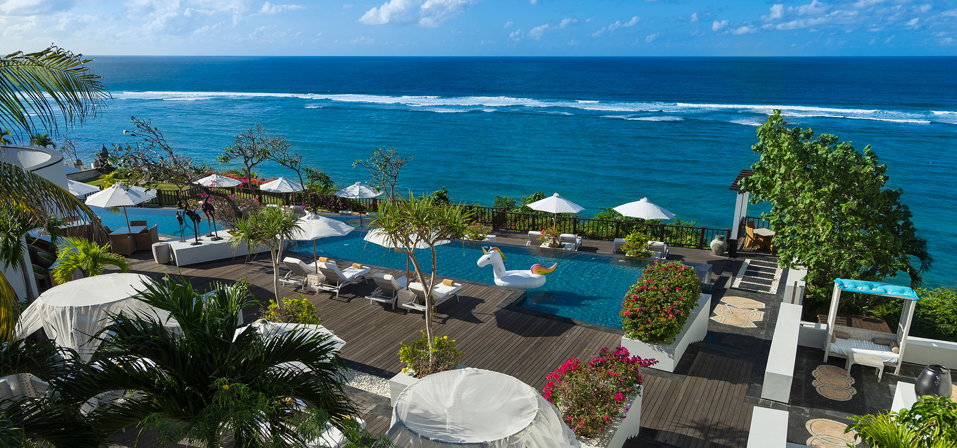 Pool Beach front view at Samabe Bali Suites & Villas